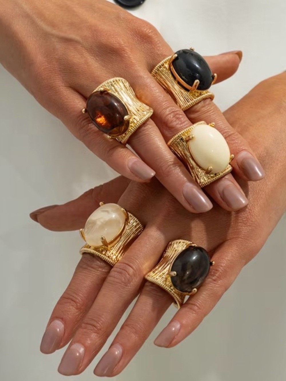 Gold-Tone Wide Band Ring with Black Cabochon Stones